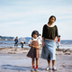 Illustration for article titled Time traveling photographer adds herself into her childhood pictures